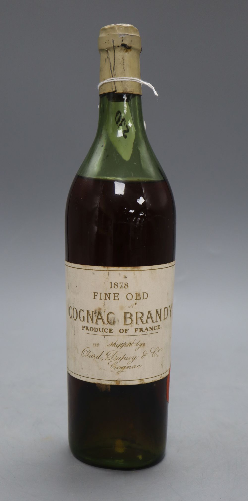 A bottle of 1878 Fine Old Cognac Brandy